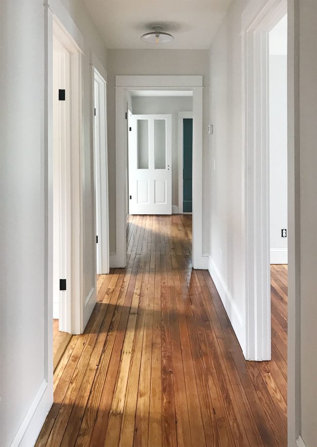 clear sealed pine floors in upstairs hallway