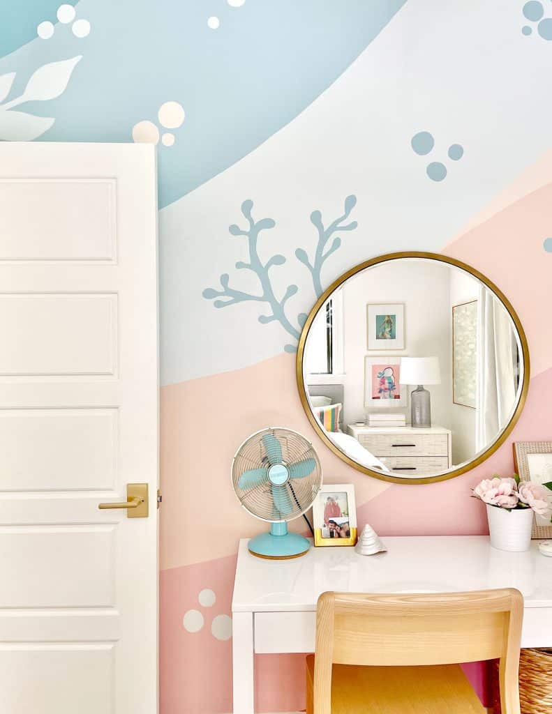 Colorful Girls Bedroom With Blue Pink Coral Beachy Mural With Gold Mirror Over Desk