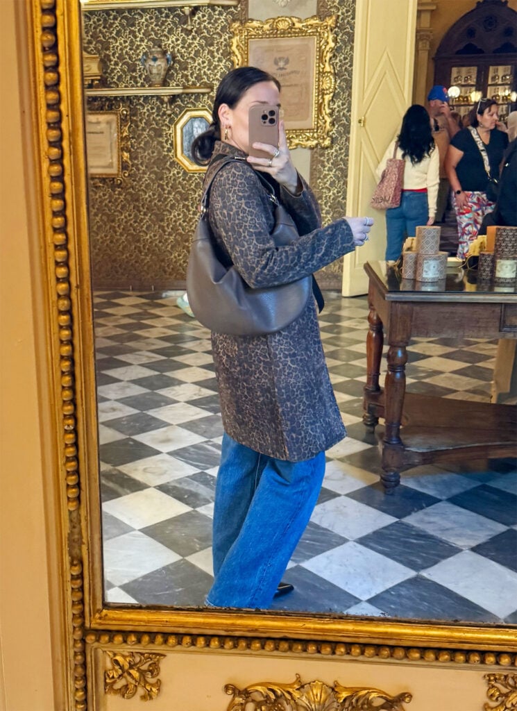 Sherry Selfie In Mirror With Leopard Coat And Jeans In Florence Italty